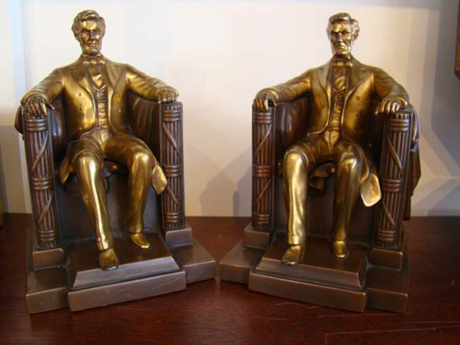 A pair of "Lincoln in the chair" bookends by Jennings Brothers of Bridgeport, CT., circa 1935